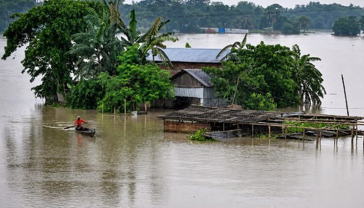 Flood-affected area in Assam with waterlogged houses and roads as relief operations continue across seven districts after floods affected 1.78 lakh people.